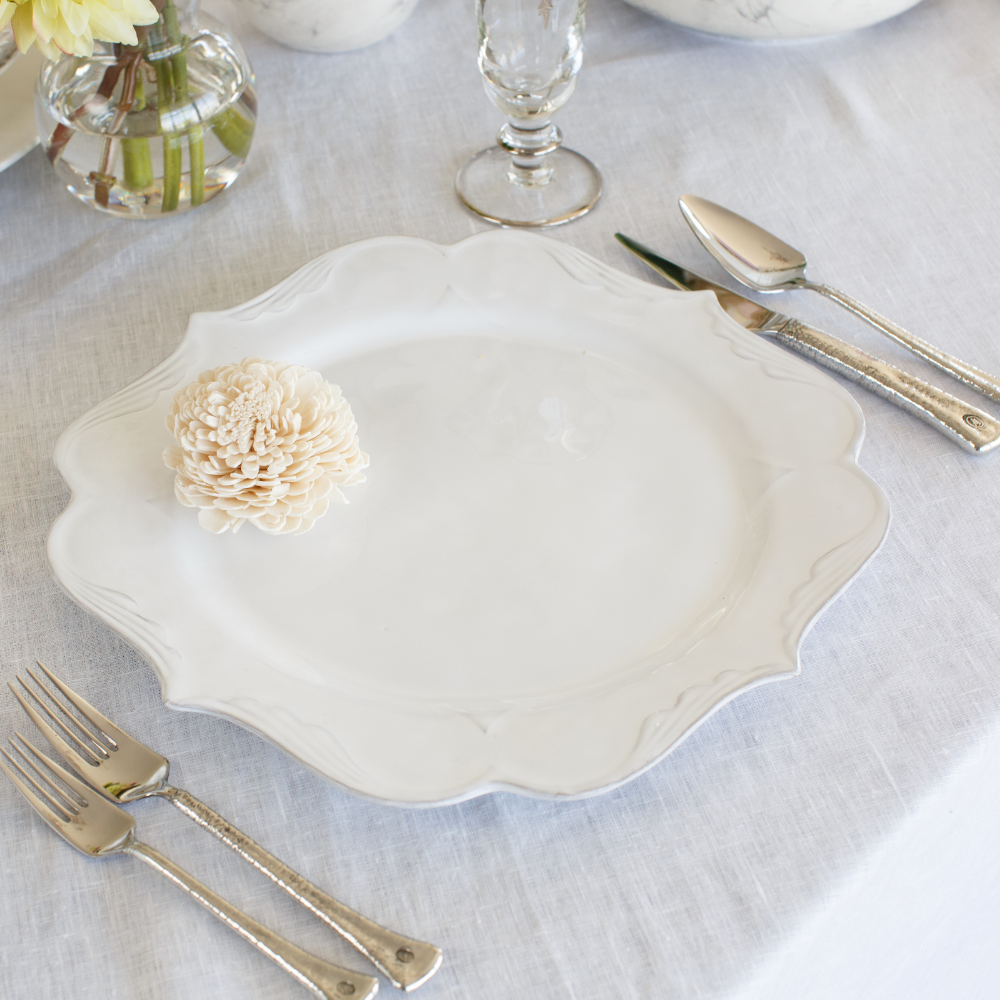 Arte Italica Bella Bianca filigree charger Italian stoneware simple side detail of charger on table