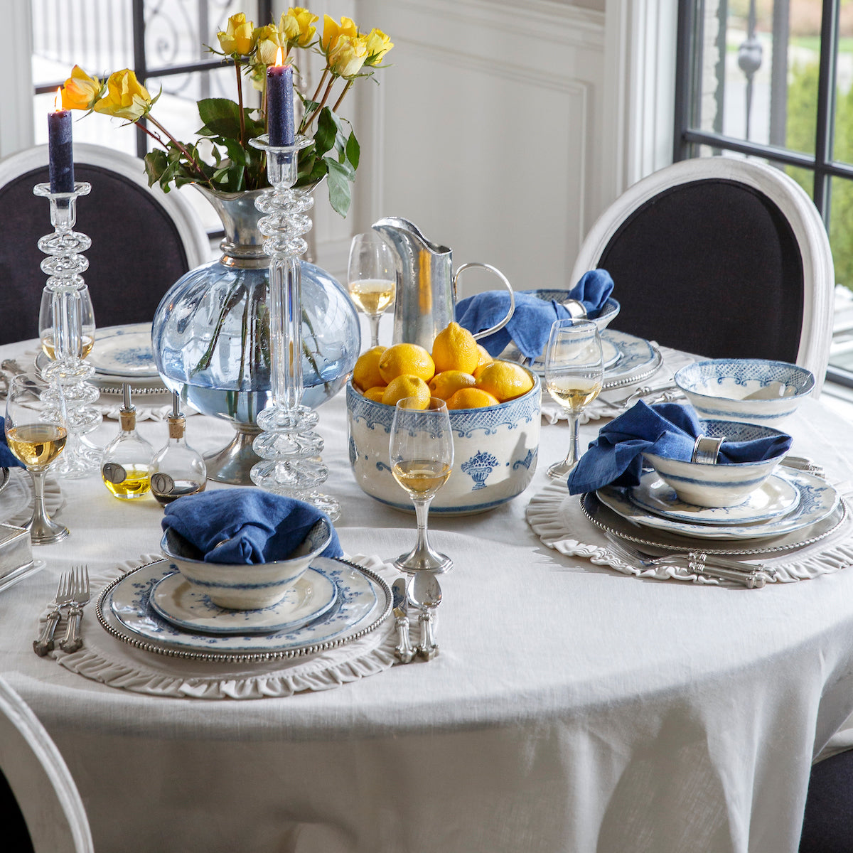 Arte Italica Burano dinner plate blue ceramic Italian hand painted dinnerware, decorative table plate shown with full table place settings