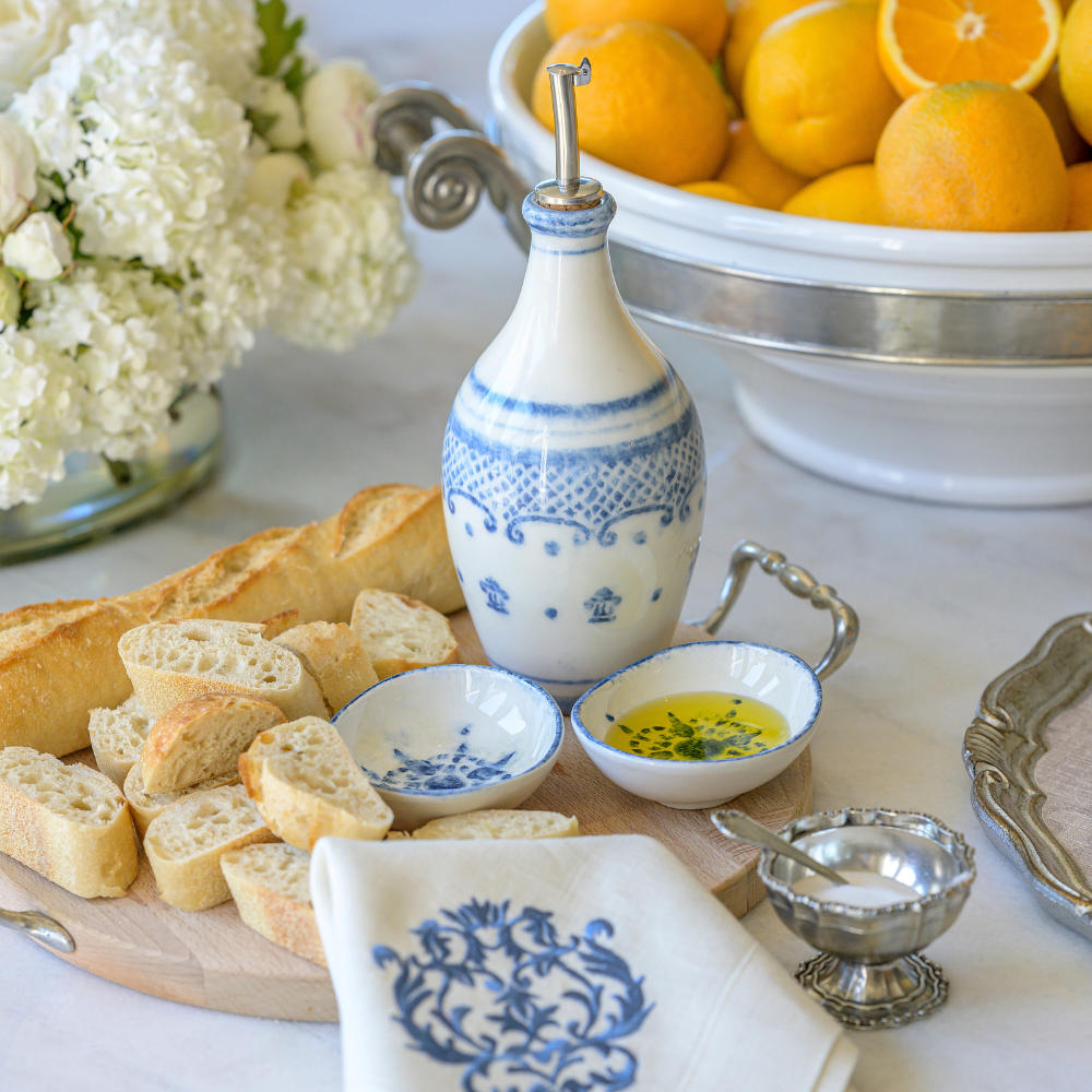 Arte Italica Burano dipping bowl set blue ceramic Italian hand painted dinnerware with bread and oil on serving platter