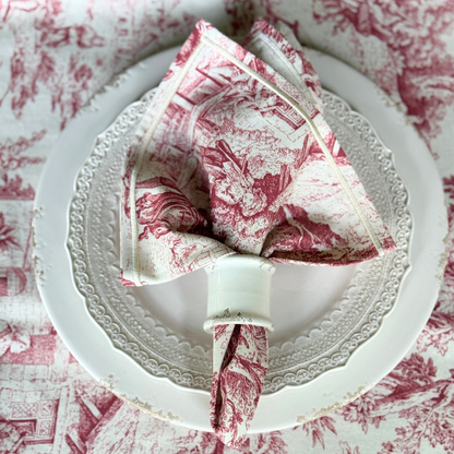 Montefalco Toile Italian Cotton Napkin in Red and Cream on a Place setting with matching tablecloth