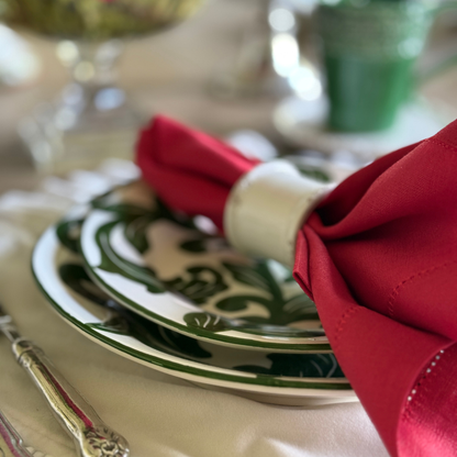 Detailed shot of green painted rim of Al Fresco plates. 