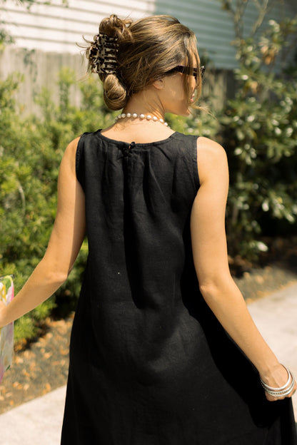Back detailed shot of black linen Katherine dress. --Arte Italica and Crown Linen Designs