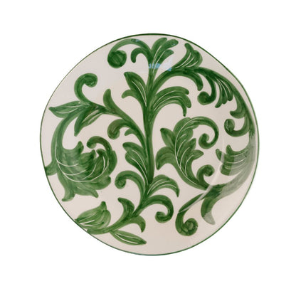 White Ceramic plate with green hand-painted swirling vine design. 