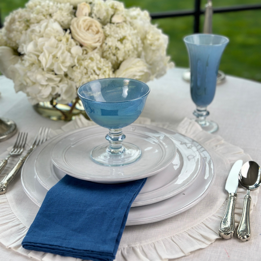Rialto hand painted Italian Glass Compote in Blue with Flute on a table with Firenze plates - Arte Italica