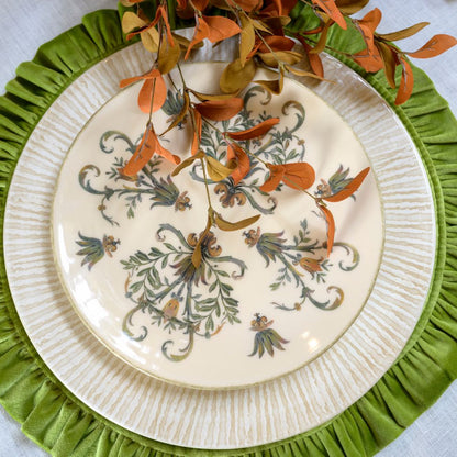 Italian Villa Dinner plate with floral design and striped charger on a Pear Velvet round ruffle placemat
