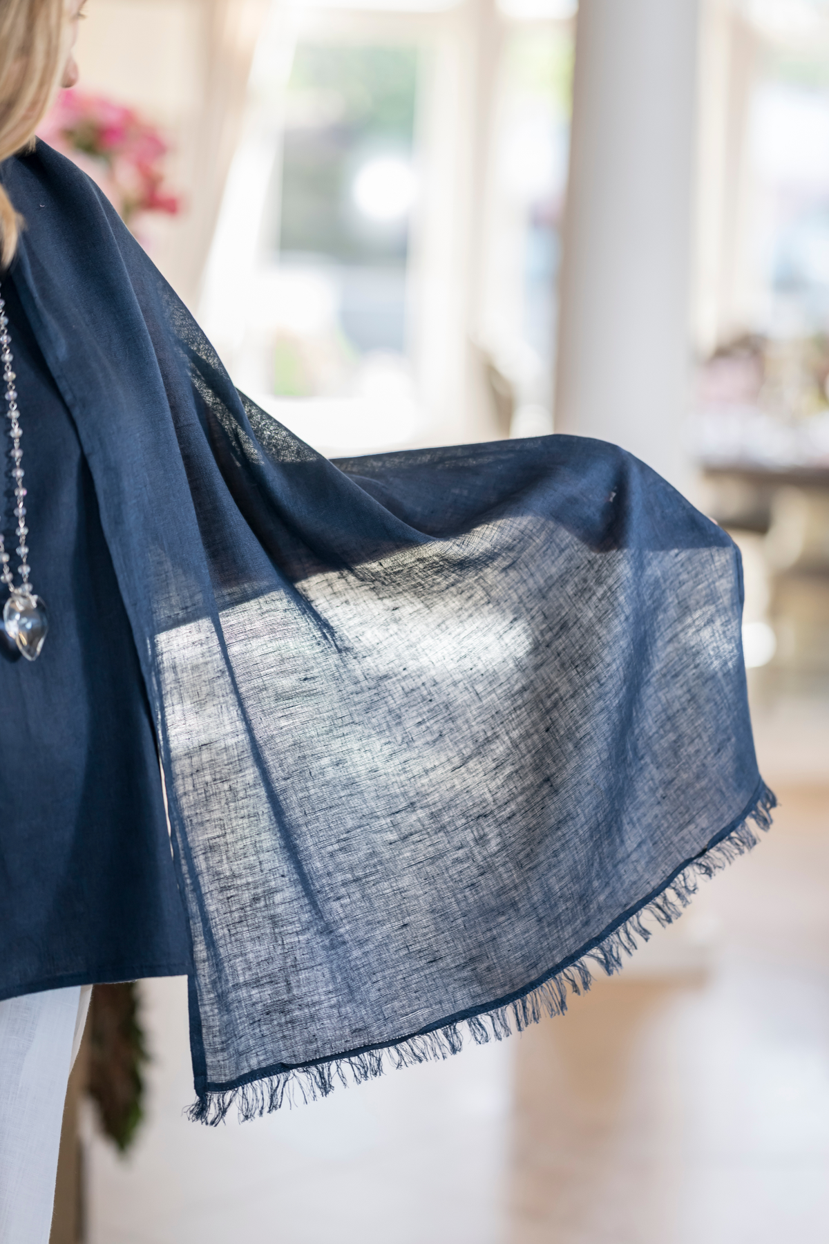 Close-up detail of navy Farrah Fringe linen scarf showing lightweight linen weave and fringe edge. --Arte Italica and Crown Linen Designs