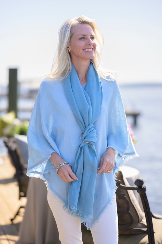 Farrah Fringe Adriatic Blue Scarf styled flat lay, showing rich blue color and fringe detailing.