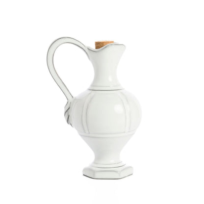 White ceramic Firenze Cruet pitcher with a cork lid on a white background