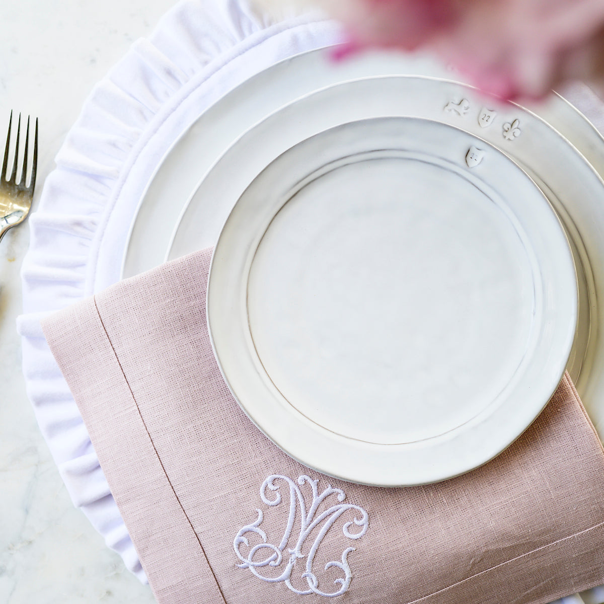 Firenze Salad Dessert Plate in stack with a Pink Linen monogram napkin