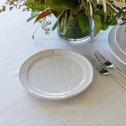 White Firenze Salad Dessert Plate on a white linen tablecloth