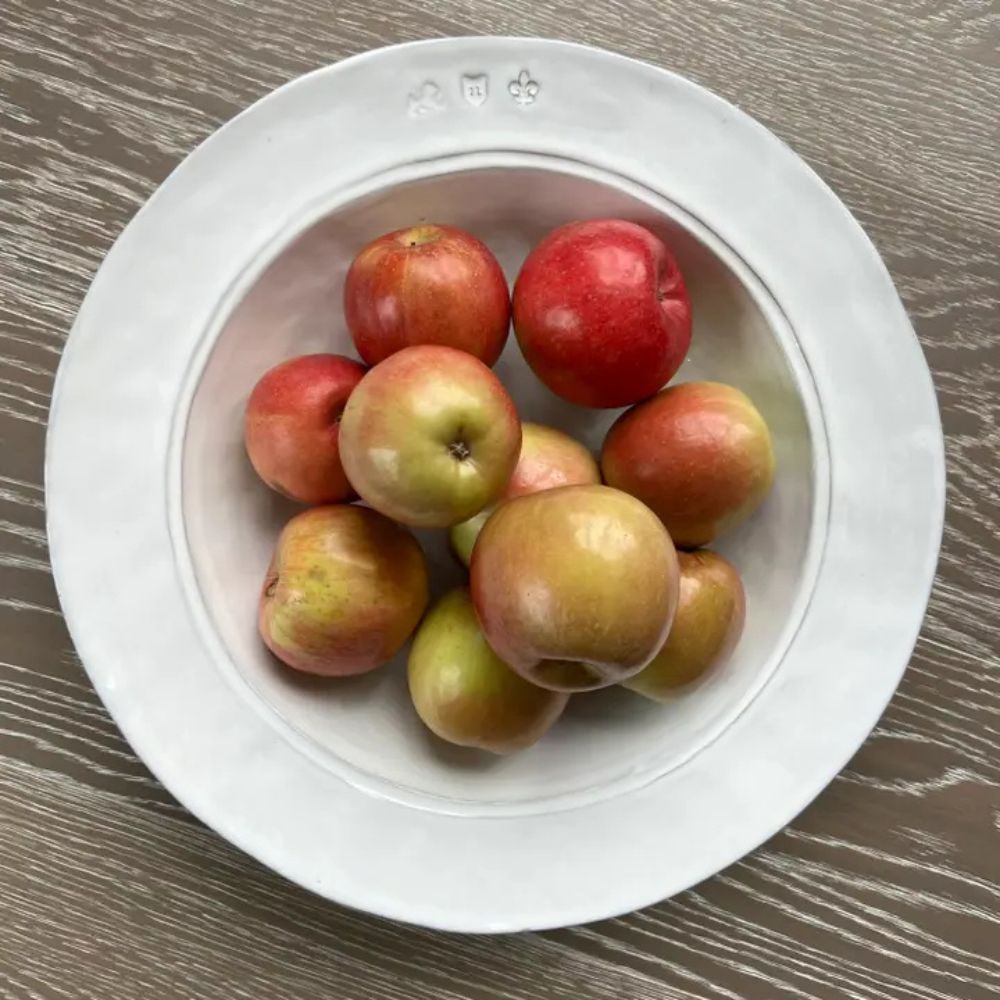 White Firenze Stoneware Serving Bowl on Table with apples