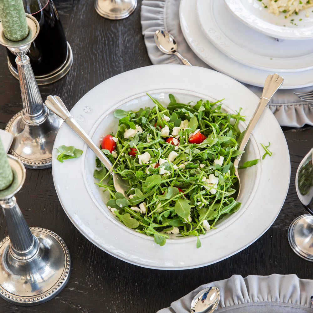 White Firenze Stoneware Serving bowl with Green Salad on a table