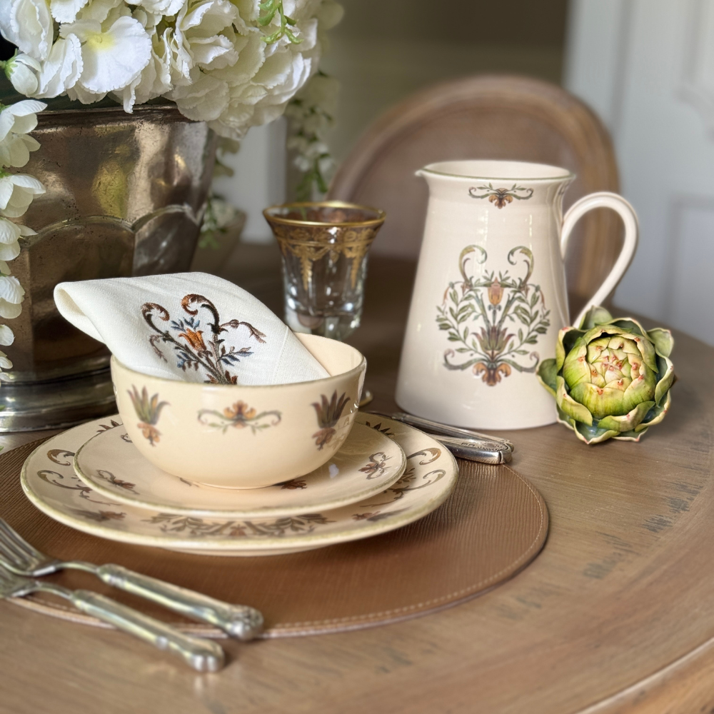 Cream-colored ceramic pitcher from Arte Italica's Villa Collection