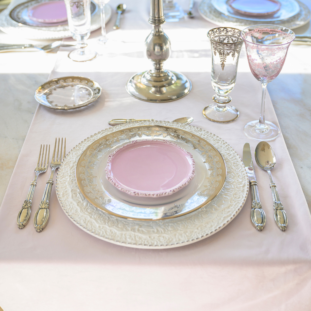 Villa Veneto Flatware Collection styled with Vetro Gold and Pink accents.