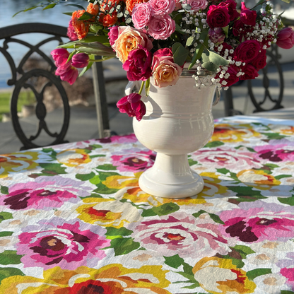 Arte Italica Portofino Summer Garden Table Square — Floral arrangement in a Tuscan vase on table outdoors.