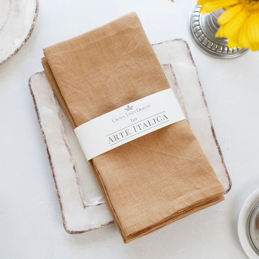 Harvest Gold Washed Linen Napkin set on a medici square plate - Arte Italica Crown Linen Designs