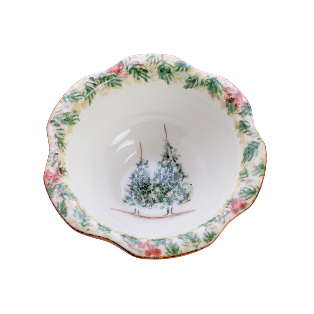 A hand painted Natale Italian ceramic small bowl with a scalloped edge on a plain white background