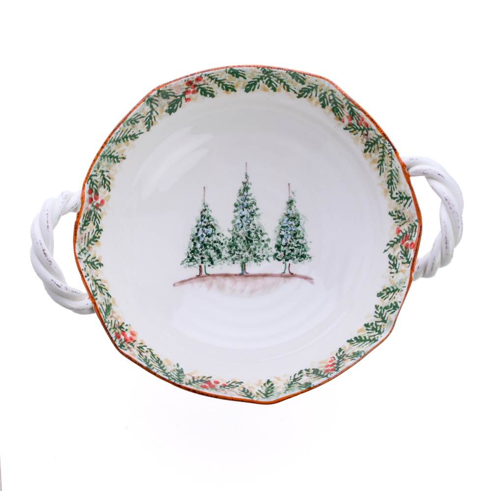Natale ceramic twist handle bowl shown from the top with the Natale pine pattern around the edge and 3 hand painted pine trees in the middle on a white background