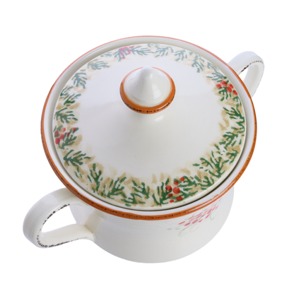 A two handled cookie jar with lid in the Arte Italica Natale pattern showing the top view of the lidwhite background
