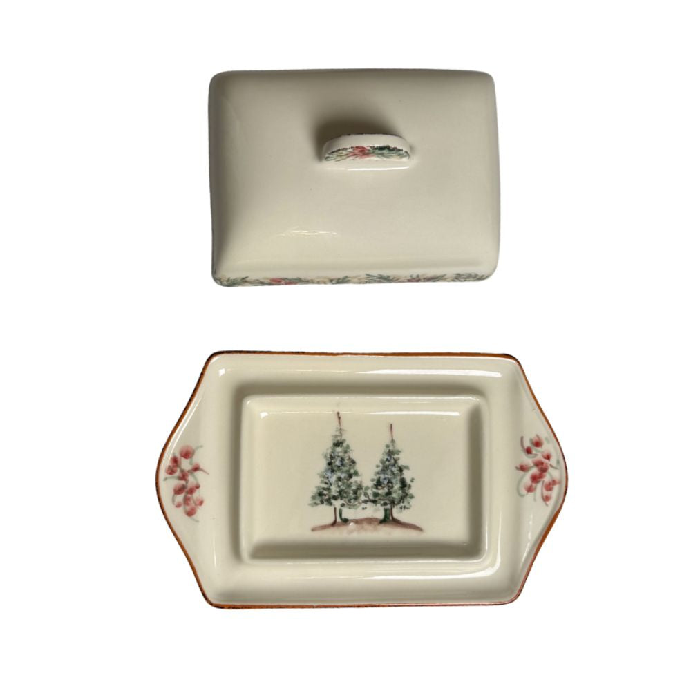Decorative Natale Italian Ceramic 2-piece Butter Dish shown from above with evergreen tree patterns on a white background by Arte Italica