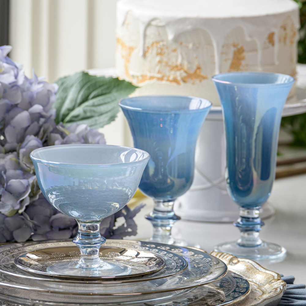 Rialto Blue Flute, Wine, and Compote with Vetro Platinum on a table - Arte Italica