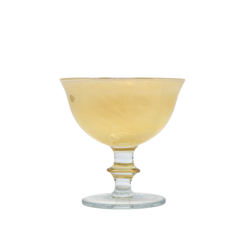 A Rialto hand painted Italian Glass Compote in yellow with a marbled look and a soft pink hue, featuring a flared bowl on a stem on a white background - Arte Italica