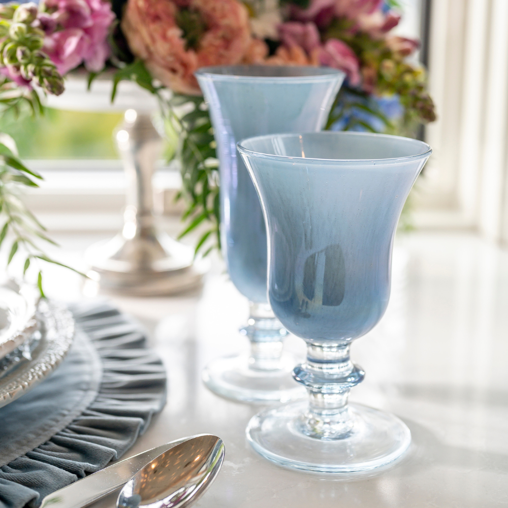 Rialto Blue Italian Water Wine Glass on a counter with matching Flute - Arte Italica