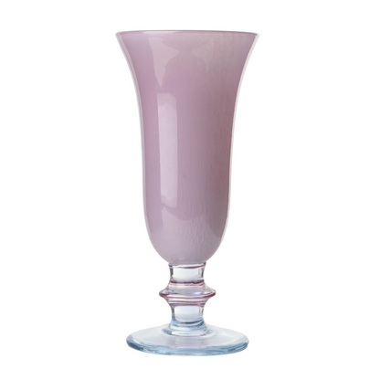 A hand-painted Italian glass flute with a white swirled design and soft pink details.