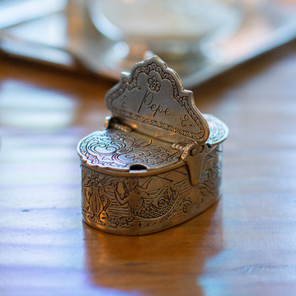 Closeup of Tavola Salt & Pepper Cellar with Spoon on wooden table 