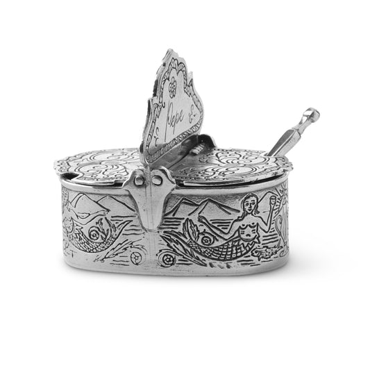 Tavola Salt & Pepper Cellar with Spoon, featuring intricate embossed designs and mermaid motifs, with a hinged lid on a white background.