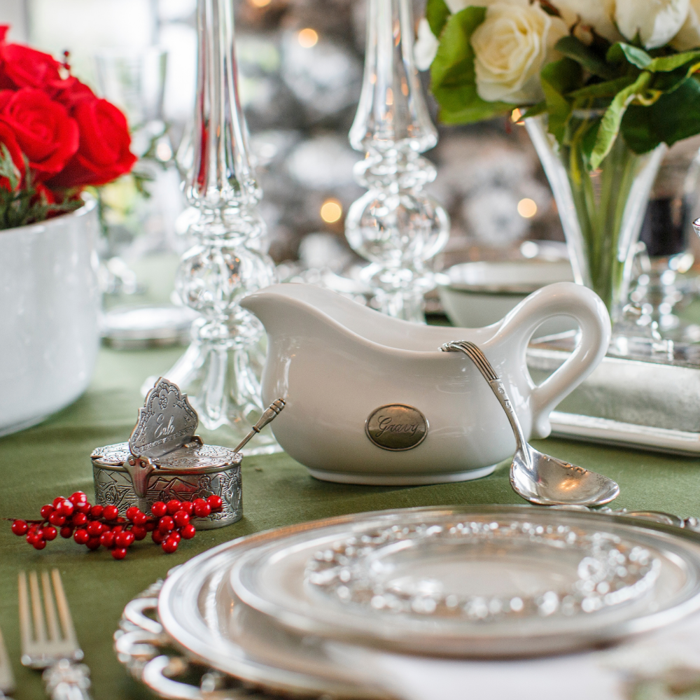 Holiday table with plates and a gravy boat showing the Tavola Salt and pepper cellar