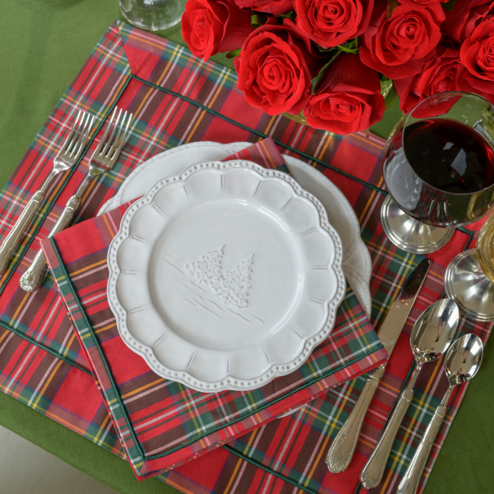 Table setting on a Tartan Red Cotton placemat with a white ceramic Bella Natale plate with Tartan Red napkin