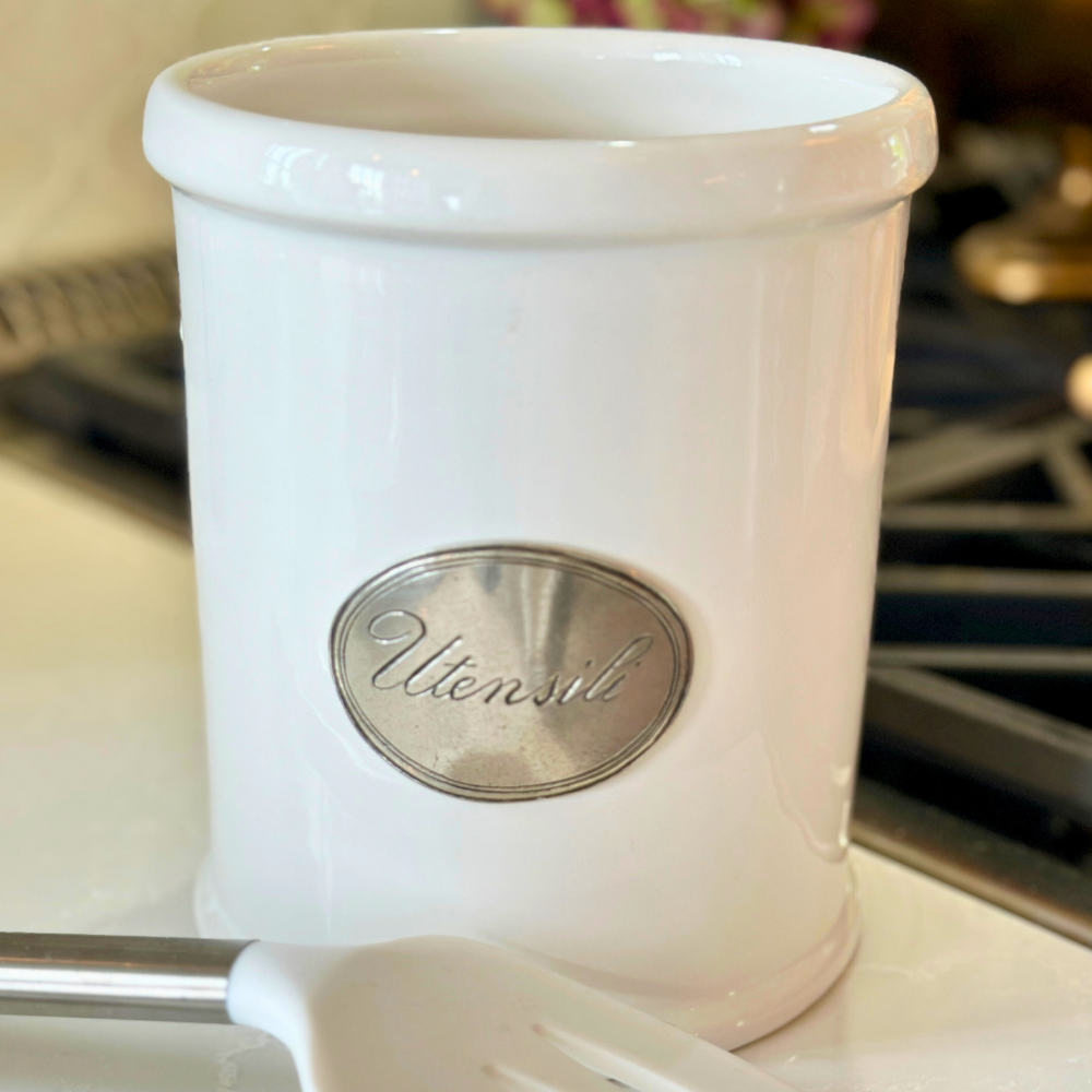 Close up shot of utensil holder on a counter