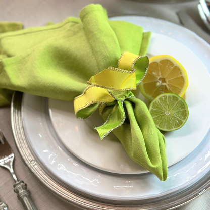Washed Linen Napkin Set Citron on a white plate with Citrus - Arte Italica Crown Linen Designs