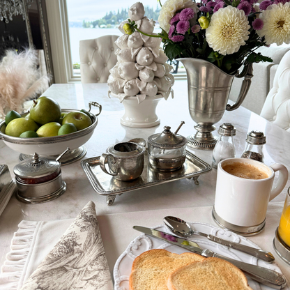 Anna Caffe pewter tray set with Creamer and Sugar on a table set for breakfast with toast, coffee and fruit