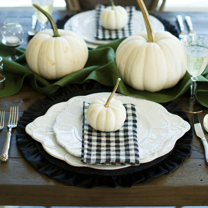 Arte Italica Bella Bianca scalloped charger platter Italian stoneware with white pumpkins on table