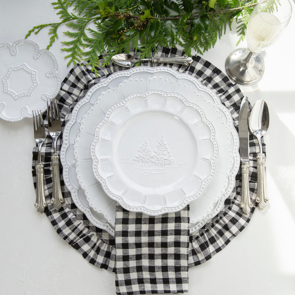 Arte Italica Bella Natale salad dessert plate Italian stoneware holiday with check napkin and placemat