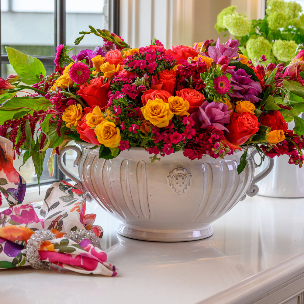 arte italica bella bianca garden urn on kitchen counter with flowers