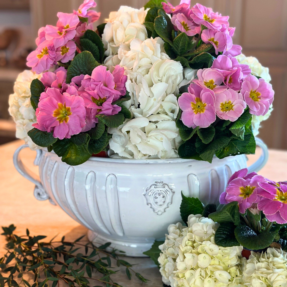 arte italica bella bianca garden urn with flowers on counter