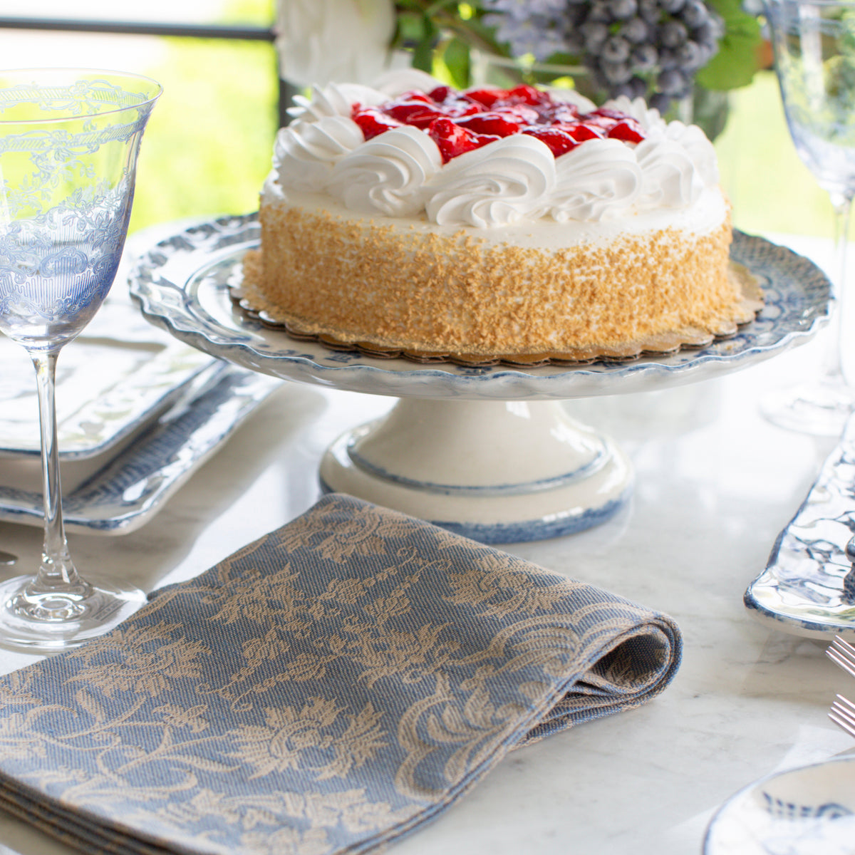 Arte Italica Burano cake stand blue ceramic Italian hand painted dinnerware, dessert stand with large cake and napkin