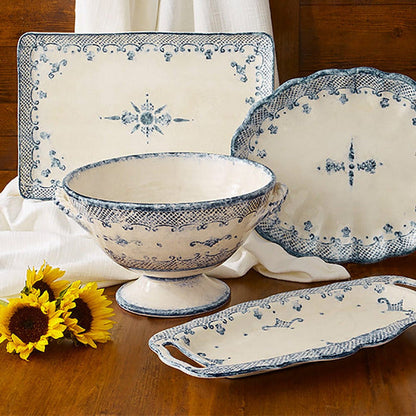 Arte Italica Burano footed bowl with handles blue ceramic Italian hand painted dinnerware collection display