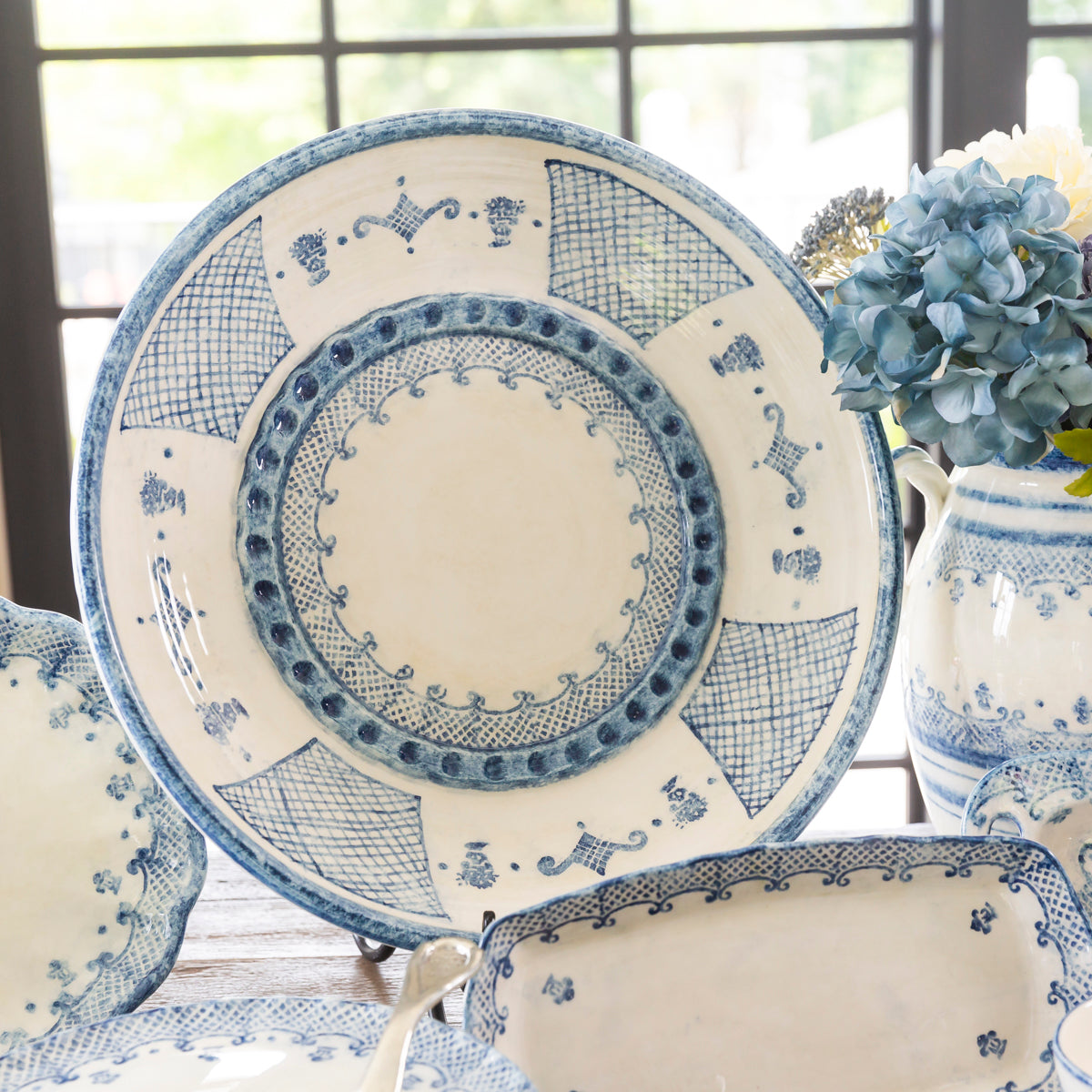 Arte Italica Burano large limited platter blue ceramic Italian hand painted dinnerware, serving platter on display 