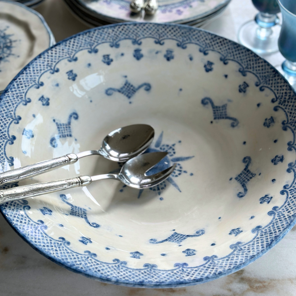 Arte Italica Burano pasta serving bowl blue ceramic Italian hand painted dinnerware inside detail with serving spoons