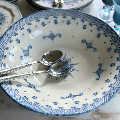 Arte Italica Burano pasta serving bowl blue ceramic Italian hand painted dinnerware inside detail with serving spoons