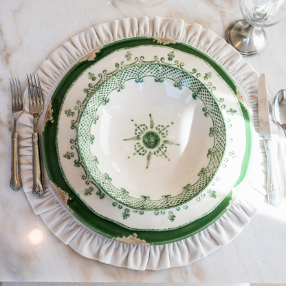 arteitalica-burano-pasta-soup-bowl-green-ceramic Italian hand painted dinnerware looking down into bowl detail on table plate stack
