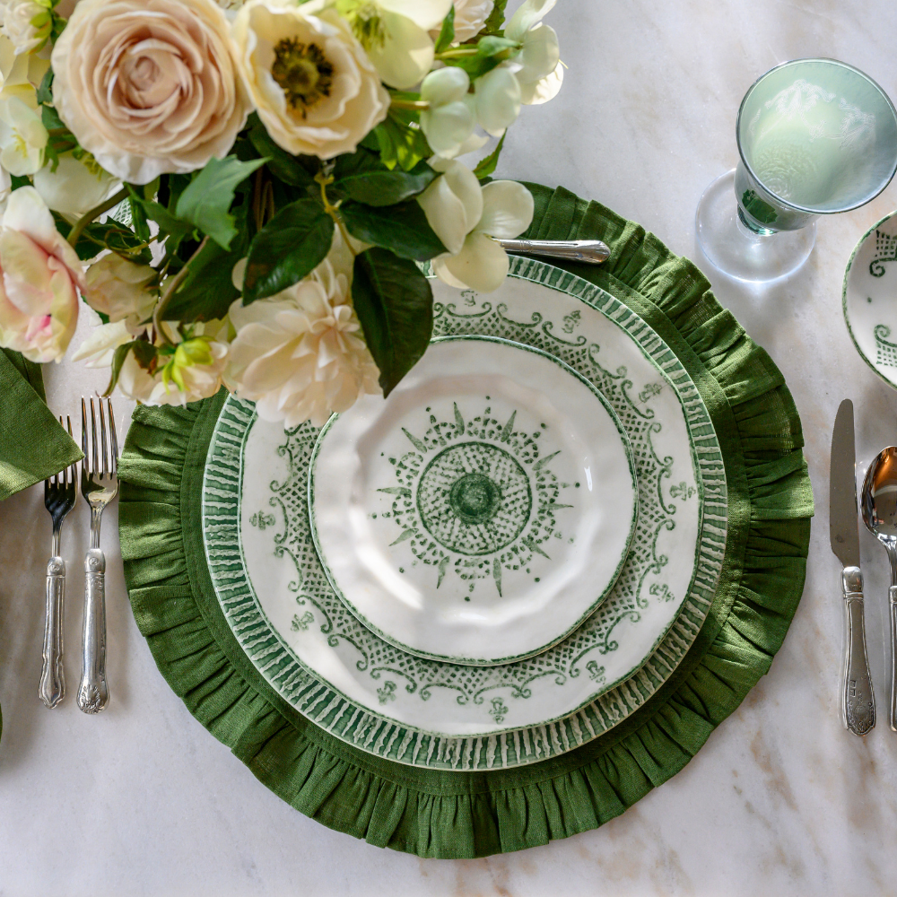 Arte Italica Burano salad and dessert plate green ceramic Italian hand painted dinnerware overhead view on table with green placemat