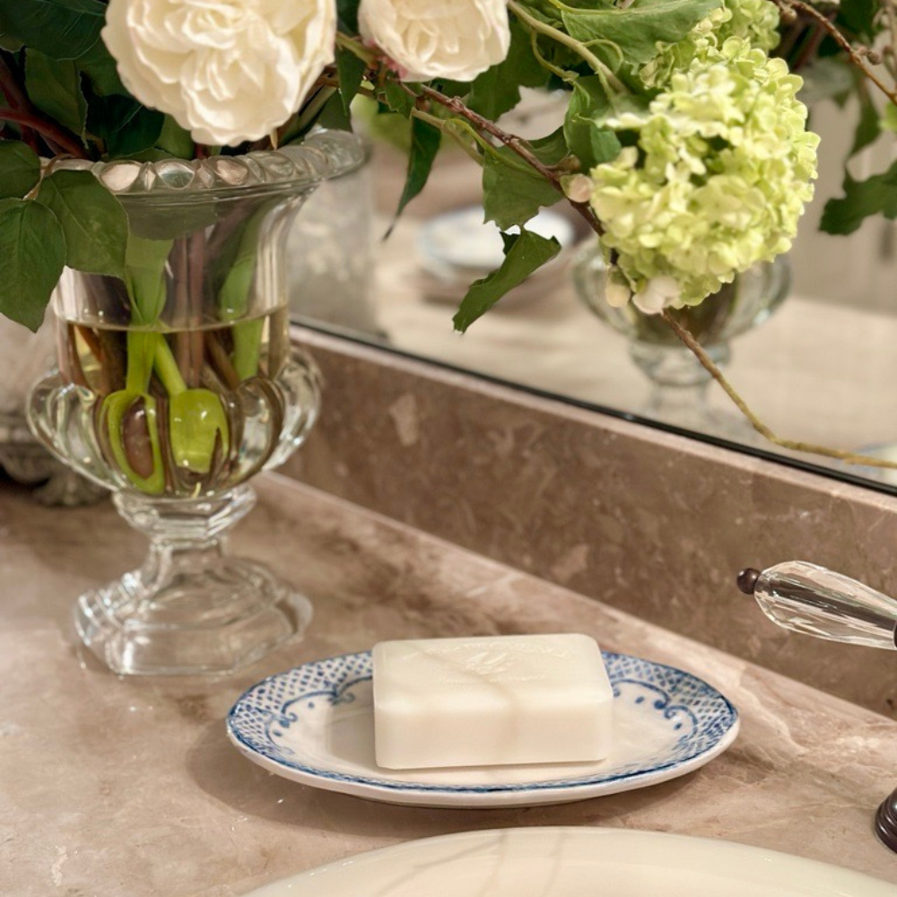 Arte Italica Burano small oval dish blue ceramic Italian hand painted dinnerware, serving platter with soap by sink and flowers