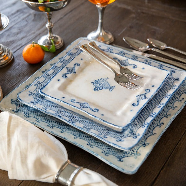 Arte Italica Burano square salad and dessert plate blue ceramic Italian hand painted dinnerware plate stack on wood table
