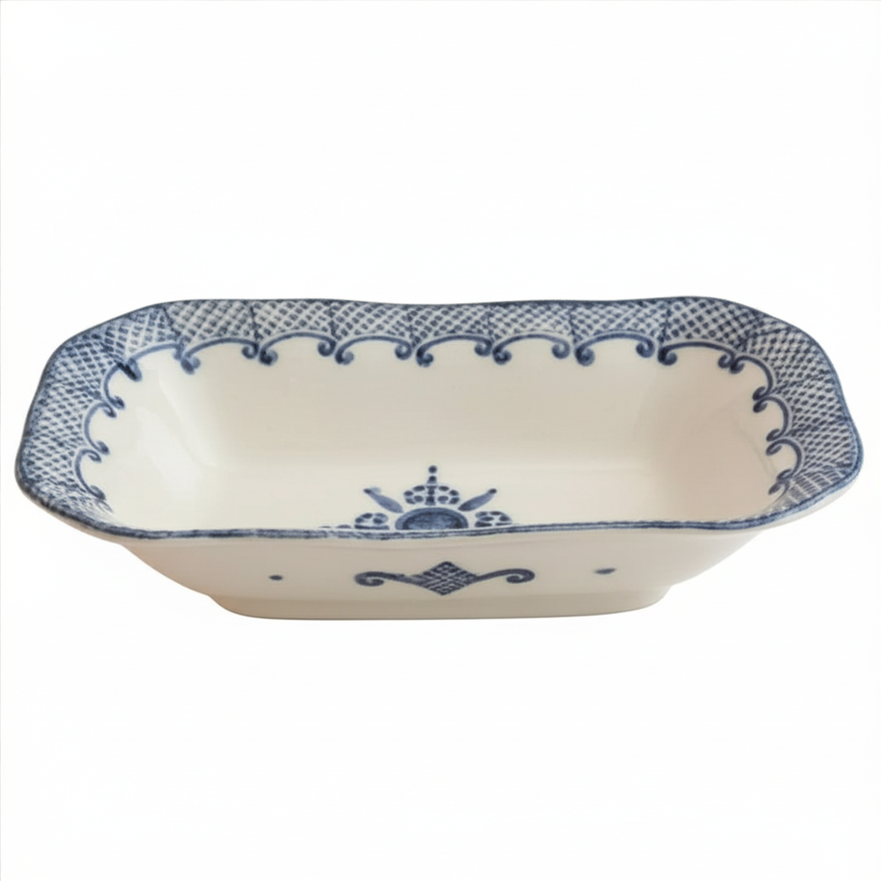 Rectangular ceramic dish with blue decorative patterns on a white background